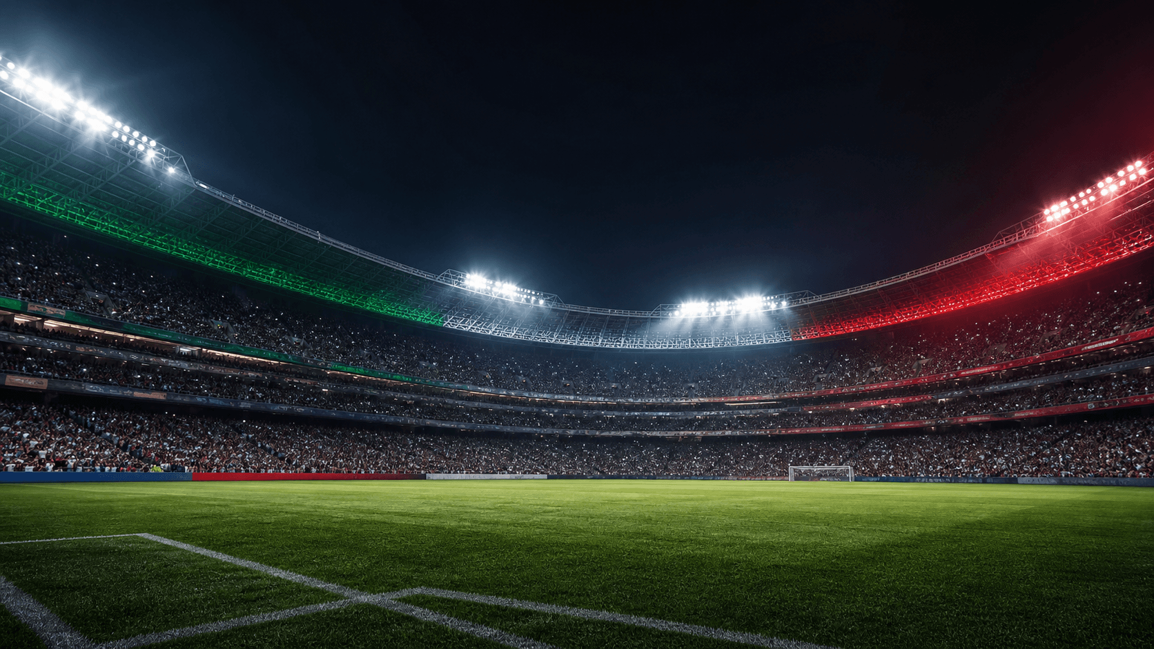 Floodlit football stadium at night